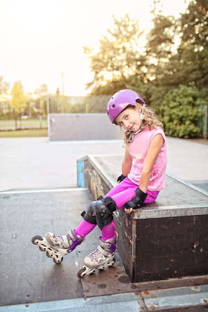 Young girl on the roller skateの写真素材
