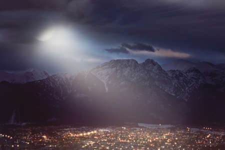 ray of lunar light falls on the city buriedの写真素材