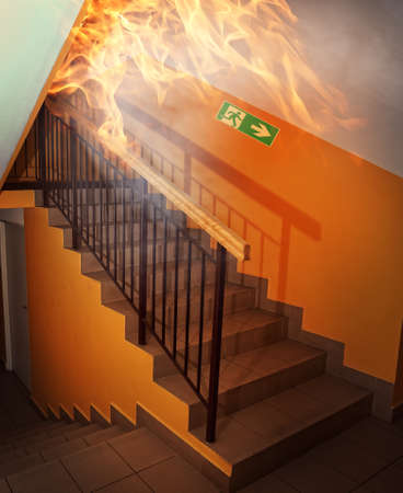 fire on the staircase in the buildingの写真素材