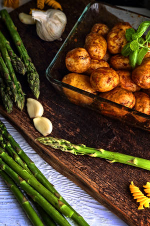 baked asparagus with potatoesの写真素材