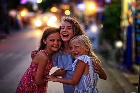 friends laugh on a summer eveningの写真素材