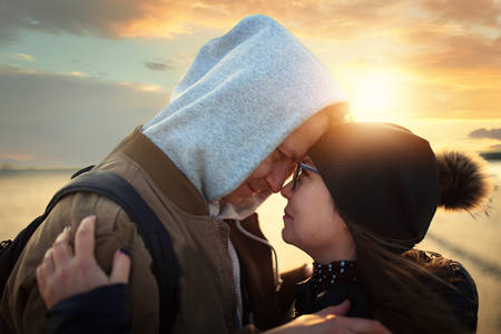 couple hugs on a sunny day