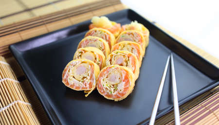 delicious and appetizing fish susshi with pancake dough crustの写真素材