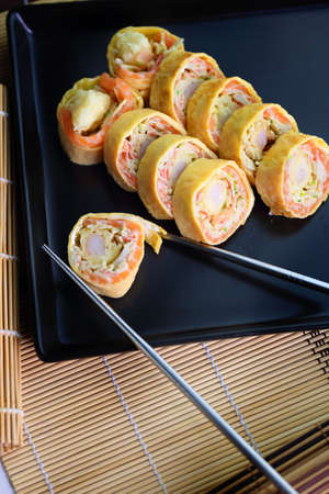 delicious and appetizing fish susshi with pancake dough crustの写真素材