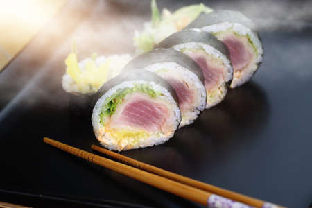 appetizing and tasty smoked sushiの写真素材