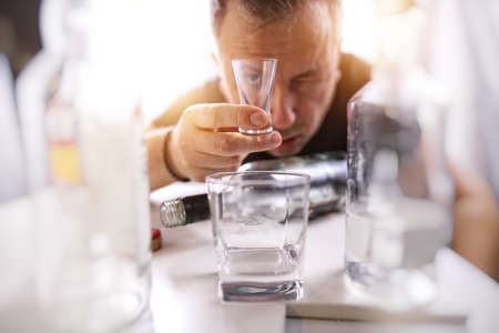 drunk man with an alcohol problem needs therapyの写真素材