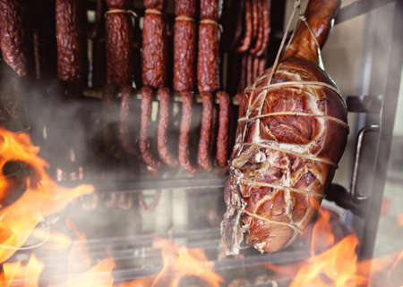 ham and sausages in a smokehouseの写真素材