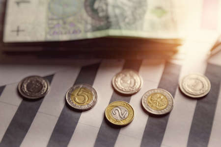 Polish currency on printed charts and analyzesの写真素材