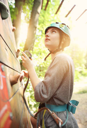 teenager climbs in the rope parkの写真素材