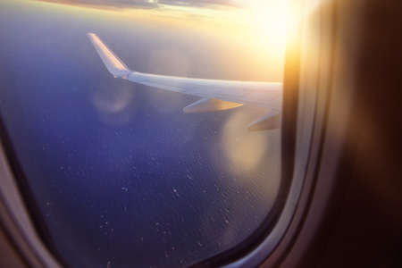 view through the window to the sea inplaneの写真素材