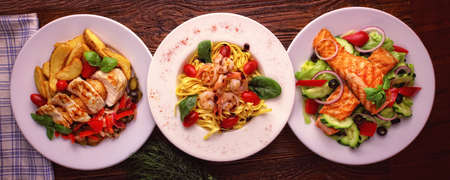 delicious dinner set - fish, shrimp and chicken breastの写真素材