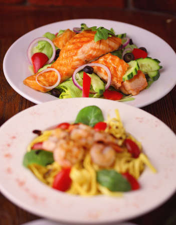 Delicious dinner set - salmon with lettuceの写真素材