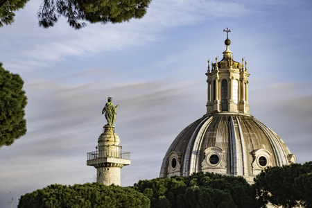 Dome, statue and trees viewing from roman Forum, Rome Italyのeditorial素材