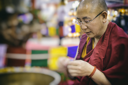 ROME ITALY, APR 2017: Traditional tibetan monk working with his hands at Oriental Festival in Romeのeditorial素材