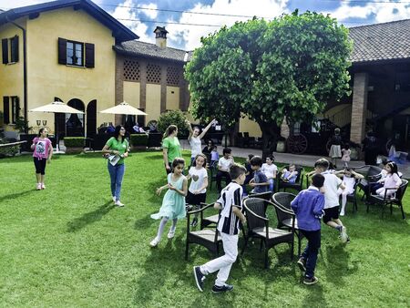 MILAN, ITALY - MAY 2017, Happy kids playing in the parkのeditorial素材
