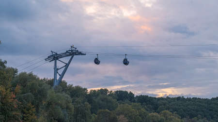 Modern cabin of the cable car on a background of dark skyの写真素材