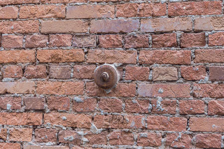 Construction technology. Iron support on a red brick wall.の写真素材