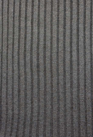 Vintage denim texture background: pocket with a button-down shirt close-up. Stylish pocket with...