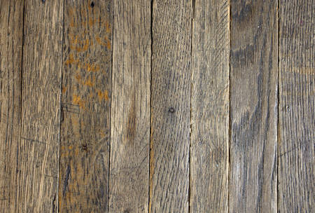 A old dirty brick parquet. Rough surface texture. parquet with stains of paint and dirt. Natural wood textureの写真素材