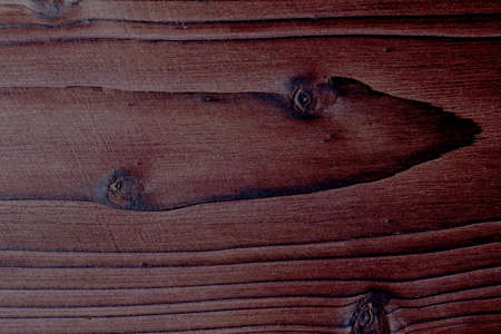 Wooden background of burnt wood. Old wooden background, burnt wood texture, rustic style banner. Burnt wooden Board texture. Burned scratched hardwood surface. Brown colorの写真素材