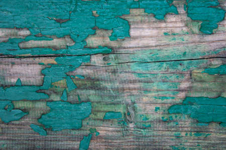 Weathered blue wooden background texture. Shabby wood teal or turquoise green painted. Vintage beach wood backdrop. Shabby decrepit wooden boards. Wood lamellas. Blue rough painted planks surface.の写真素材