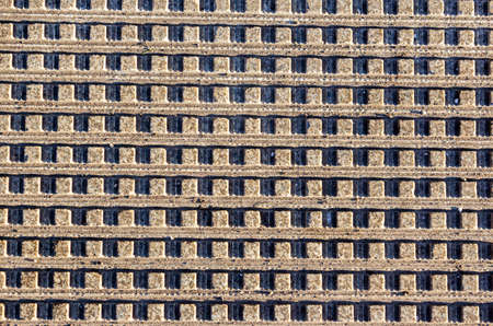 Squares on a yellow background are illuminated with hard light, seamless pattern. The view from the top, lying flatの写真素材
