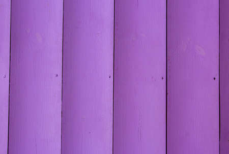 Lilac Background Of Wooden Boards. Texture of pink wooden boards. Light lilac surface of wooden boards, parquet. Wood wall pattern. Light texture of natural wood. Wooden plank boards background.の写真素材