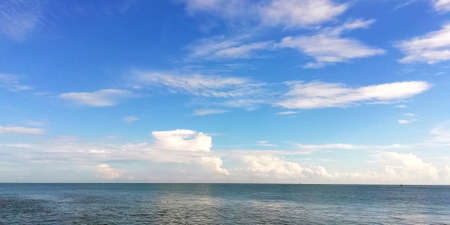 Sea water, white clouds with blue skyの素材