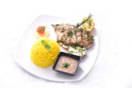 Grilled chicken breast with kabsa riceの写真素材