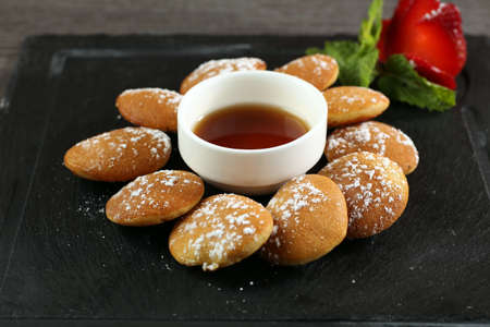 Mini pancakes with strawberry & syrupの写真素材
