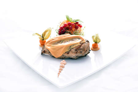 Grilled chicken breast with mushroom sauce & vegetablesの写真素材