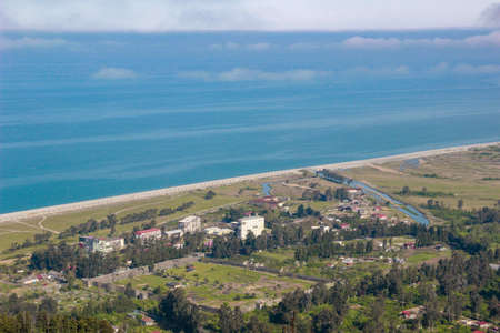 View of Gonio Apsaros Fortress, Black Sea beach and surrounding apartment buildings. Georgia, Gonioの写真素材