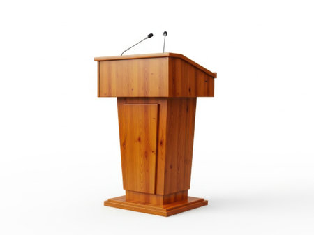 A polished wooden podium equipped with two flexible microphones stands ready for a conference, presentation, speech, or debate. Isolated on white.の写真素材
