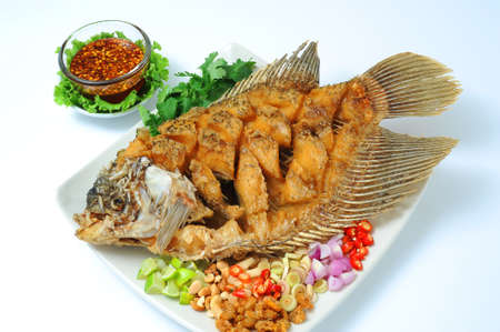 Deep fried fish with herbal sauce