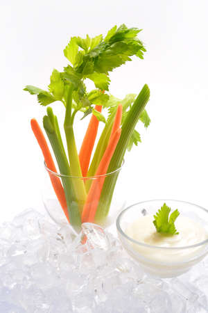 vegetables and salad cream on iceの写真素材