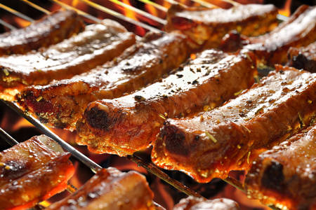 Grilled pork ribs on the grill の写真素材