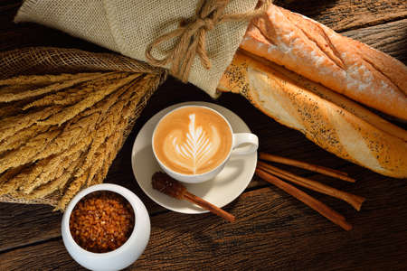 A cup of cafe latte and breadの写真素材