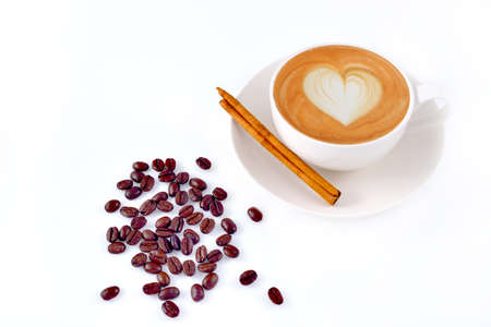 Cup of coffee and coffee beans isolated on white background