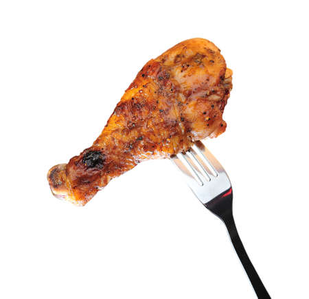 Grilled chicken leg isolated on white backgroundの写真素材