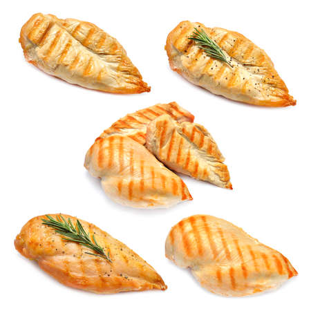 Grilled chicken breasts isolated on white backgroundの写真素材