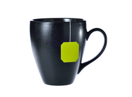 Cup of tea with tea bag (blank label) isolated on white backgroundの写真素材