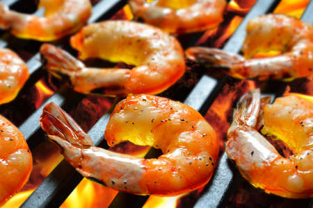 Grilled shrimps,prawns on the flaming grillの写真素材