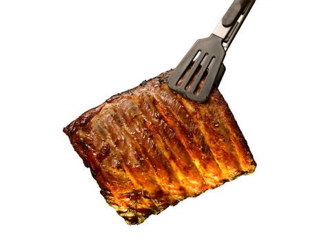 Grilled pork ribs isolated on white backgroundの写真素材