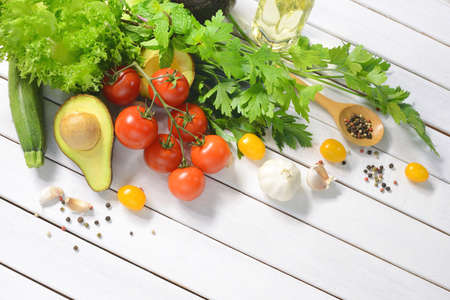 Healthy food,Vegetables and fruits on white wooden tableの写真素材