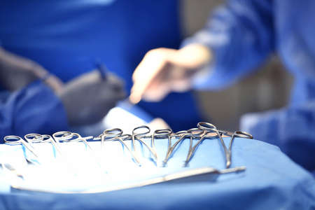 Close up image of an instrument in a tray of surgical instruments