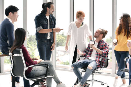 Group of businesspersons discussing  work at the office