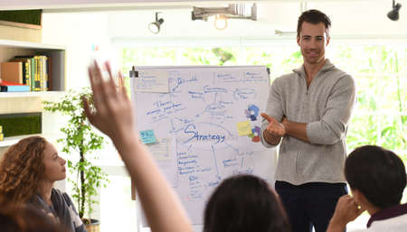 Group of businesspersons in creative business discussing work in the office