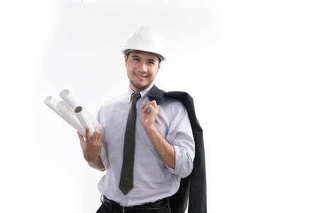 Portrait of asian engineer or architect holding blueprint smiling and look at the camera isolated on...