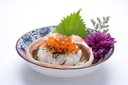 Japanese food rice with kani miso, crab dinner meal isolated on white backgroundの写真素材