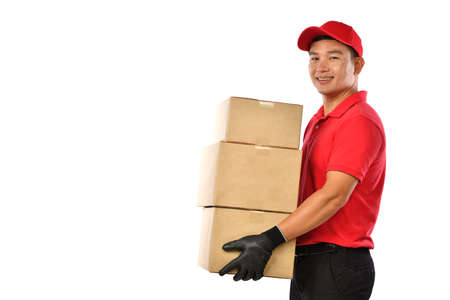 Asian delivery man in red uniform with parcel cardboard box isolated on white background
